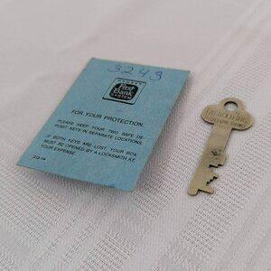 Vintage safe deposit box key Diebold with key envelope from First Bank System